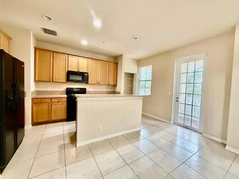 Kitchen - 335 E Thatch Palm Cir #104, Jupiter, FL 33458 photo 2 of 2