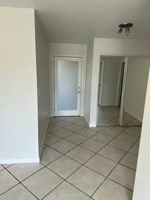 Entry Way - 1480 E Sample Rd #207, Pompano Beach, FL 33064 photo 1 of 1