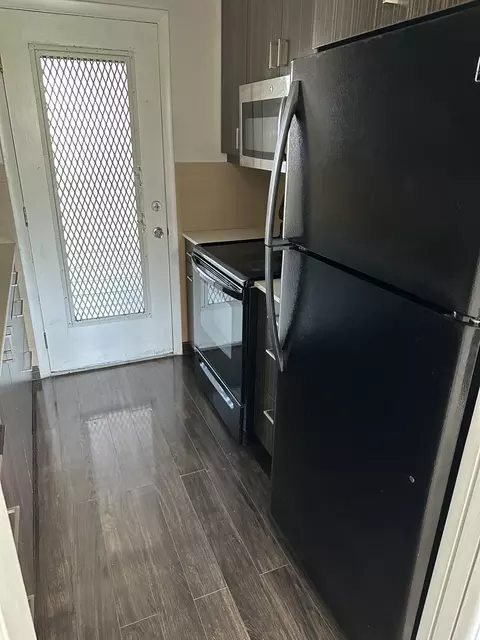 Kitchen - 1480 E Sample Rd #207, Pompano Beach, FL 33064 photo 1 of 2