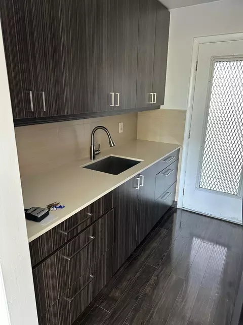 Kitchen - 1480 E Sample Rd #207, Pompano Beach, FL 33064 photo 2 of 2