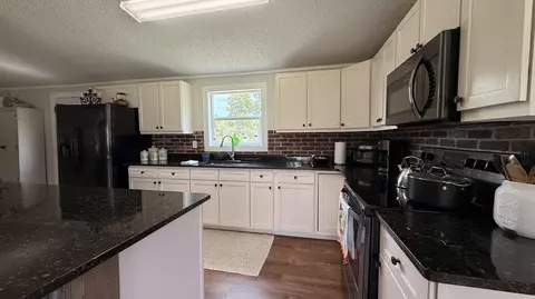 Kitchen - 5820 E Tangerine Ln, Okeechobee, FL 34972 photo 3 of 3
