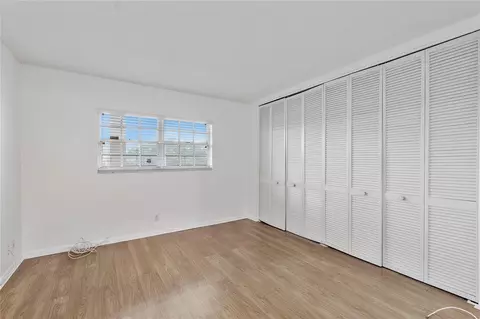 Bedroom - 9101 W Sample Rd #402, Coral Springs, FL 33065 photo 2 of 2