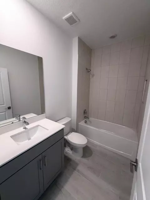 Bath - 6650 SE Park Trace Dr, Stuart, FL 34997 photo 1 of 4