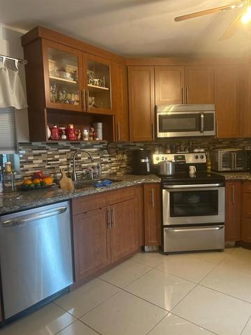 3 Greenway Vlg N #202, Royal Palm Beach, FL 33411