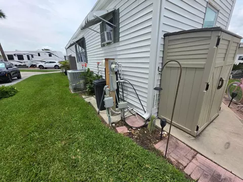 Exterior - 5354 SE 64th Ter, Okeechobee, FL 34974 photo 6 of 13
