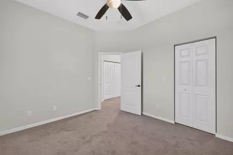 Bedroom - 4277 SW Pine Cove Ct, Stuart, FL 34997 photo 7 of 9