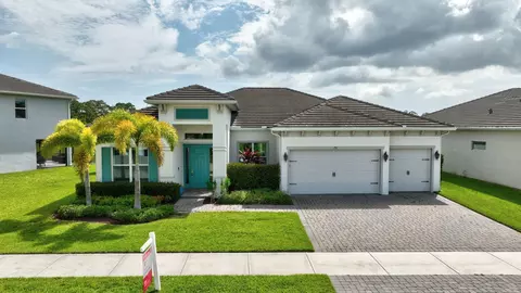 Exterior - 735 SW Pennfield Ter, Stuart, FL 34997 photo 3 of 9