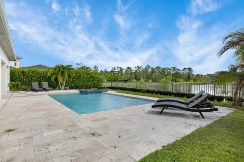 Exterior - 735 SW Pennfield Ter, Stuart, FL 34997 photo 5 of 9