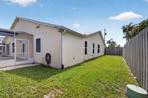 Exterior - 5673 SE Inez Ave, Stuart, FL 34997 photo 5 of 11