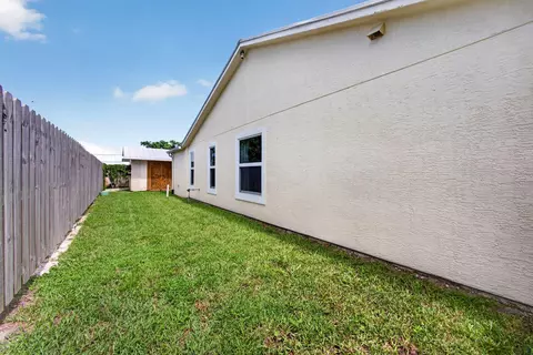 Exterior - 5673 SE Inez Ave, Stuart, FL 34997 photo 3 of 11