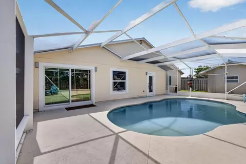 Exterior - 5673 SE Inez Ave, Stuart, FL 34997 photo 9 of 11