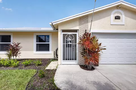 Exterior - 5673 SE Inez Ave, Stuart, FL 34997 photo 2 of 11