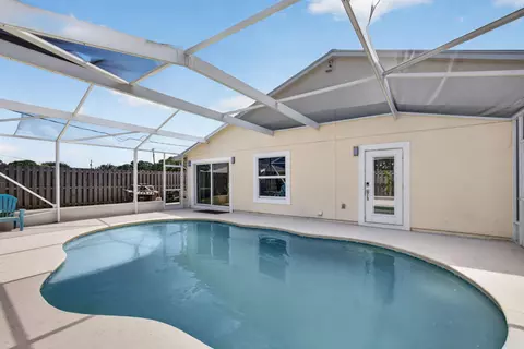Exterior - 5673 SE Inez Ave, Stuart, FL 34997 photo 7 of 11