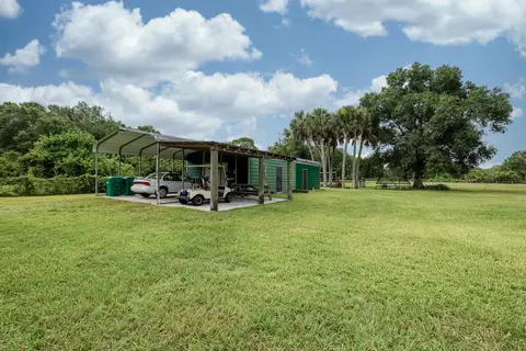 Exterior - 7346 NW 93rd Ct, Okeechobee, FL 34972 photo 7 of 15