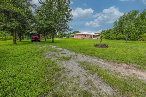 Exterior - 7346 NW 93rd Ct, Okeechobee, FL 34972 photo 1 of 15