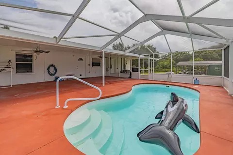 Exterior - 7346 NW 93rd Ct, Okeechobee, FL 34972 photo 4 of 15