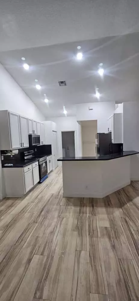 Kitchen - 15941 Mellen Ln, Jupiter, FL 33478 photo 1 of 3
