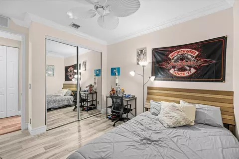 Bedroom - 910 SW Lost River Shores Dr, Stuart, FL 34997 photo 6 of 8