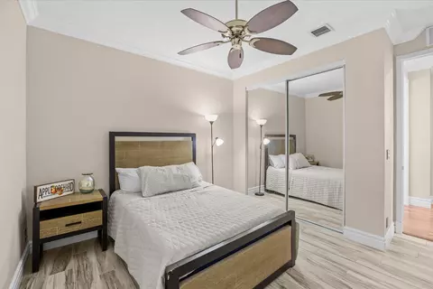 Bedroom - 910 SW Lost River Shores Dr, Stuart, FL 34997 photo 4 of 8