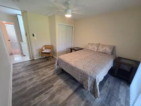 Bedroom - 5403 SE Miles Grant Rd #H108, Stuart, FL 34997 photo 8 of 9