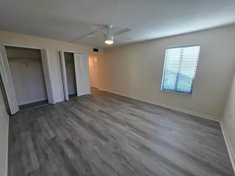 Bedroom - 5403 SE Miles Grant Rd #H108, Stuart, FL 34997 photo 3 of 9