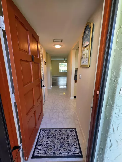 Entry Way - 5403 SE Miles Grant Rd #H108, Stuart, FL 34997 photo 1 of 5
