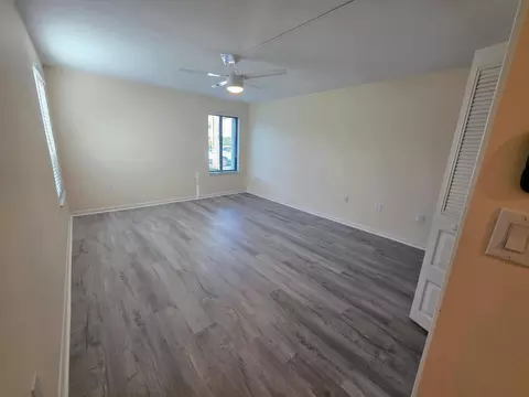 Living - 5403 SE Miles Grant Rd #H108, Stuart, FL 34997 photo 5 of 7