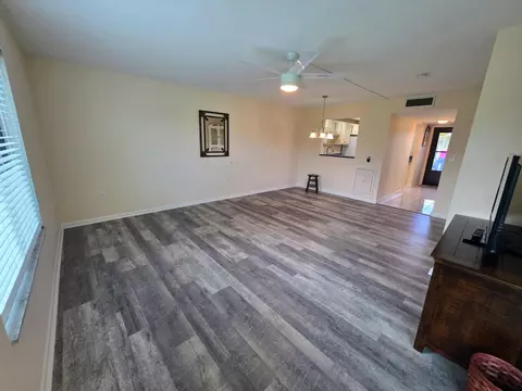 Living - 5403 SE Miles Grant Rd #H108, Stuart, FL 34997 photo 4 of 7