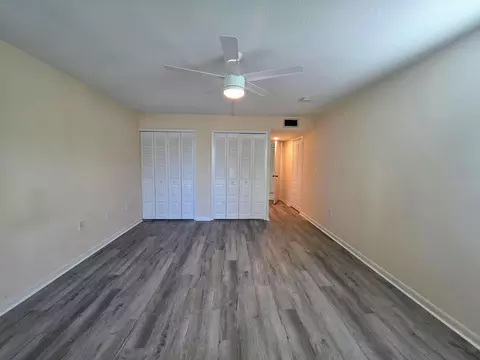 Bedroom - 5403 SE Miles Grant Rd #H108, Stuart, FL 34997 photo 2 of 9