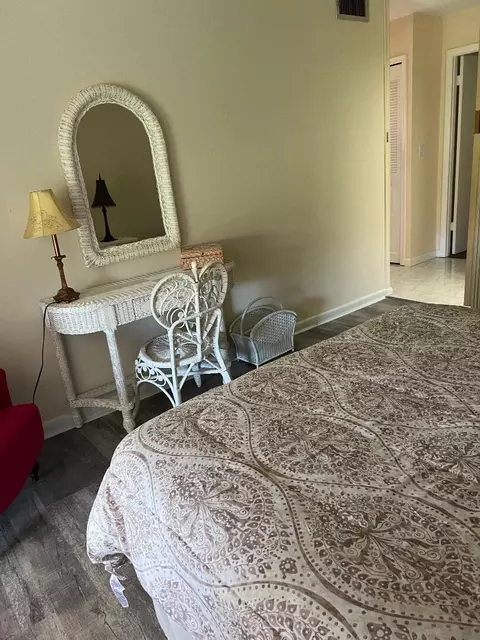 Bedroom - 5403 SE Miles Grant Rd #H108, Stuart, FL 34997 photo 6 of 9