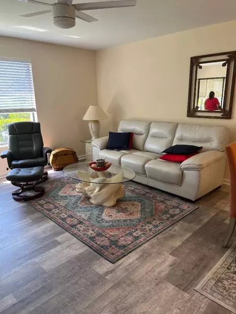 Living - 5403 SE Miles Grant Rd #H108, Stuart, FL 34997 photo 6 of 7
