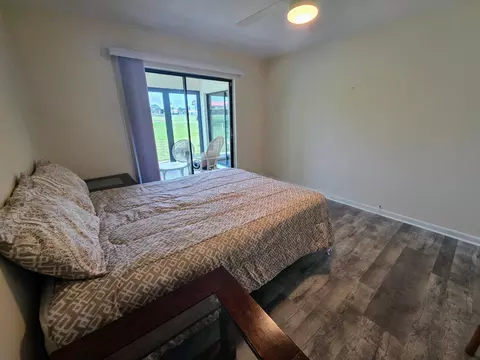 Bedroom - 5403 SE Miles Grant Rd #H108, Stuart, FL 34997 photo 9 of 9