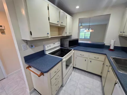 Kitchen - 5403 SE Miles Grant Rd #H108, Stuart, FL 34997 photo 1 of 5