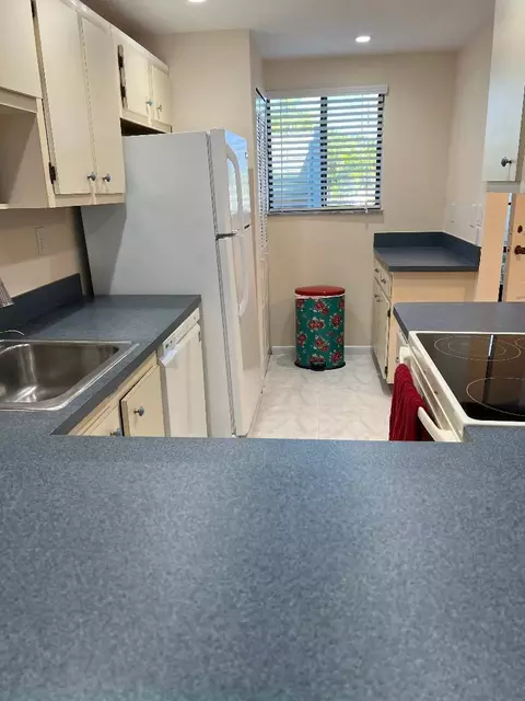 Kitchen - 5403 SE Miles Grant Rd #H108, Stuart, FL 34997 photo 5 of 5