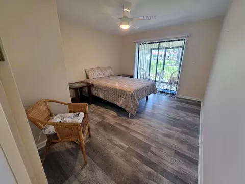 Bedroom - 5403 SE Miles Grant Rd #H108, Stuart, FL 34997 photo 7 of 9