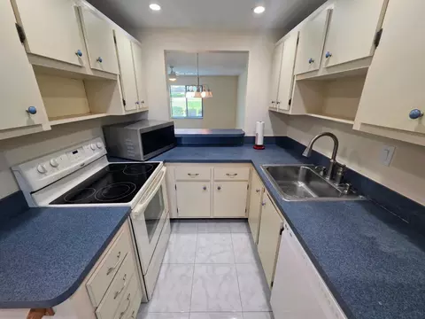 Kitchen - 5403 SE Miles Grant Rd #H108, Stuart, FL 34997 photo 3 of 5