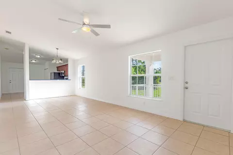 Living - 5060 SEbbtide Ave, Stuart, FL 34997 photo 2 of 2