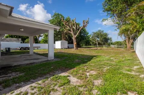 Exterior - 5060 SEbbtide Ave, Stuart, FL 34997 photo 7 of 10