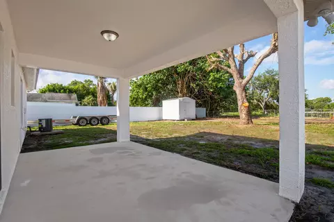 Exterior - 5060 SEbbtide Ave, Stuart, FL 34997 photo 5 of 10