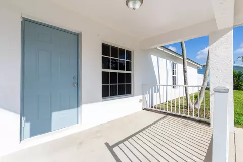 Exterior - 5060 SEbbtide Ave, Stuart, FL 34997 photo 4 of 10