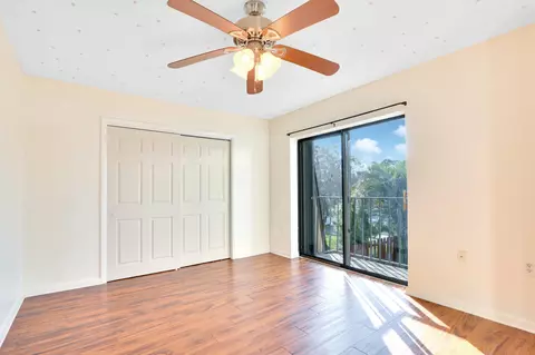 Bedroom - 5633 SE Windsong Ln, Stuart, FL 34997 photo 1 of 4