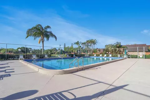 Exterior - 5633 SE Windsong Ln, Stuart, FL 34997 photo 8 of 9