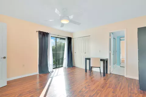Bedroom - 5633 SE Windsong Ln, Stuart, FL 34997 photo 3 of 4