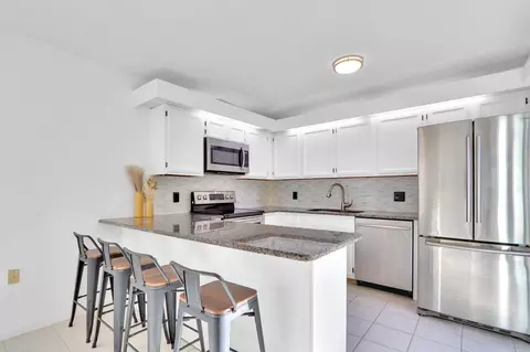 Kitchen - 5633 SE Windsong Ln, Stuart, FL 34997 photo 1 of 2