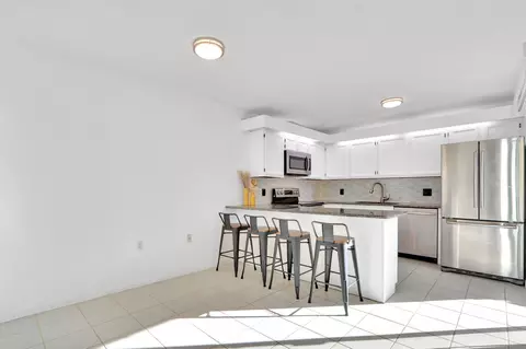 Kitchen - 5633 SE Windsong Ln, Stuart, FL 34997 photo 3 of 5