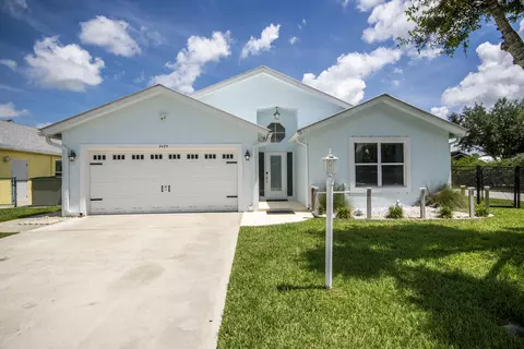 Exterior - 2483 SW Regency Rd, Stuart, FL 34997 photo 9 of 11
