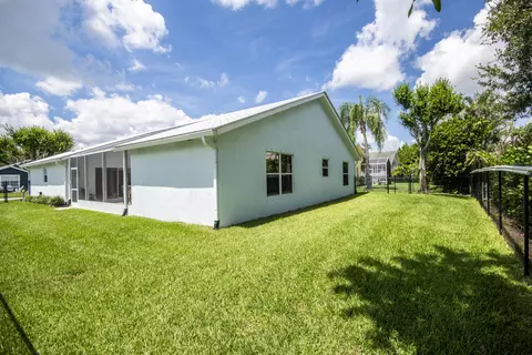 Exterior - 2483 SW Regency Rd, Stuart, FL 34997 photo 5 of 11
