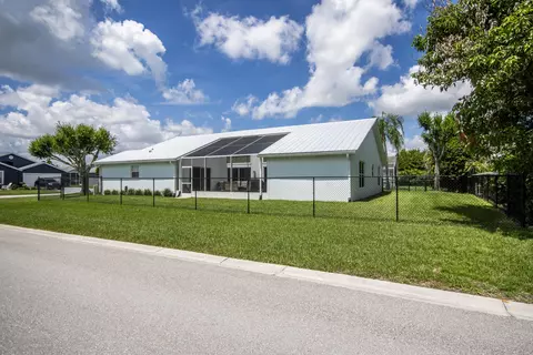Exterior - 2483 SW Regency Rd, Stuart, FL 34997 photo 6 of 11