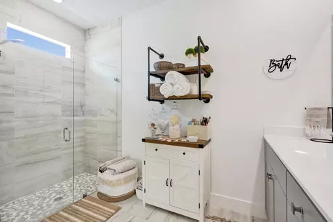 Bath - 6651 SE Park Trace Dr, Stuart, FL 34997 photo 2 of 3