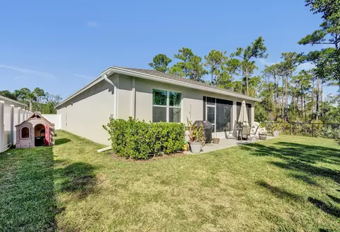 Exterior - 6651 SE Park Trace Dr, Stuart, FL 34997 photo 6 of 8